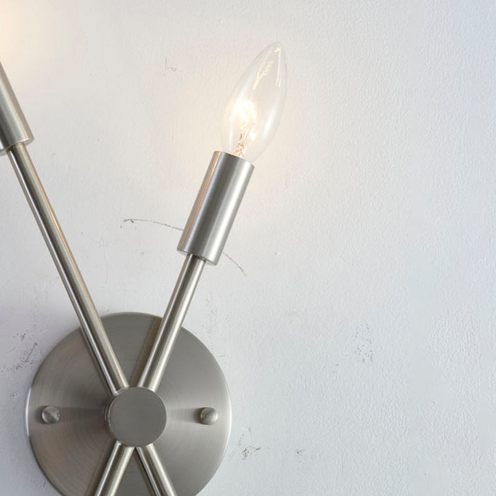 Two Pipe Arm Wall Sconce in a Finish by Bethel - view 10
