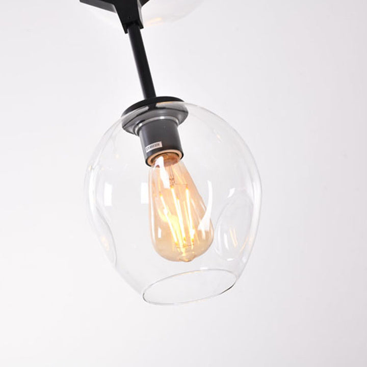 Frame Ceiling Fixture with Dented Glass Shades Arms Are