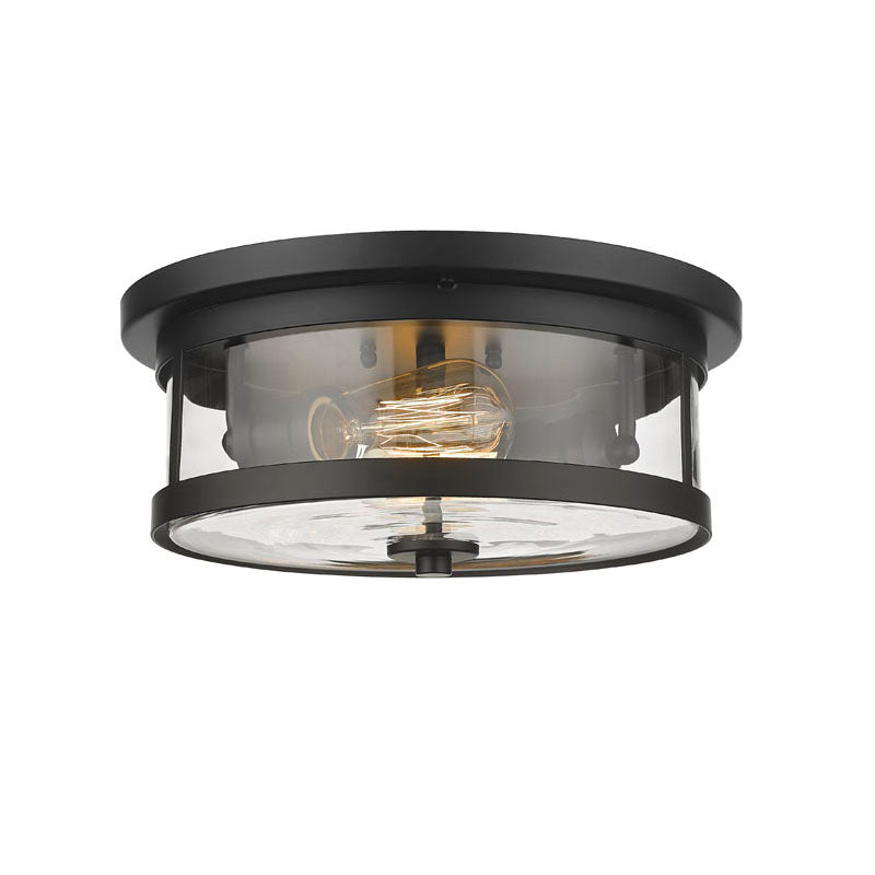 Round Flush Mount with Clear Glass Shade in Black by Bethel