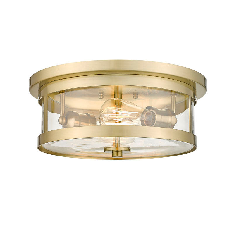 Round Flush Mount with Clear Glass Shade in Gold by Bethel