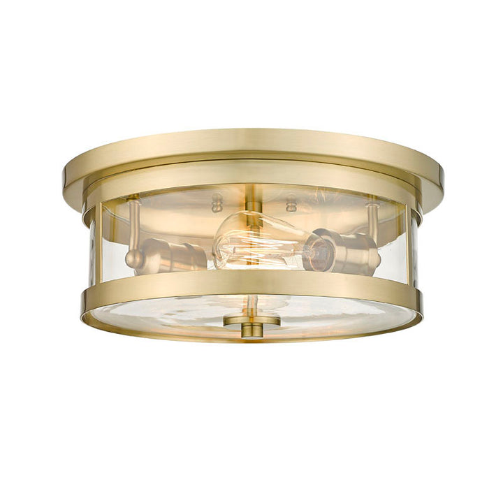 Round Flush Mount with Clear Glass Shade in Gold by Bethel