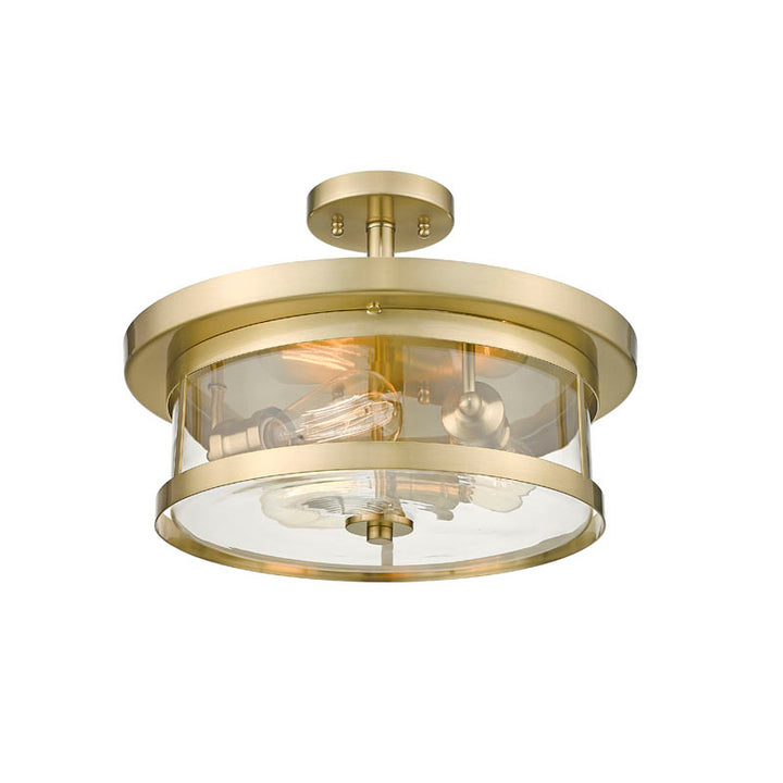 Round Semi Flush Mount with Clear Glass Shade in Gold by Bethel