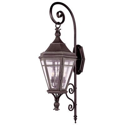 Natural Rust Curl Arm with Clear Seedy Glass Shade Outdoor Wall Sconce - LV LIGHTING