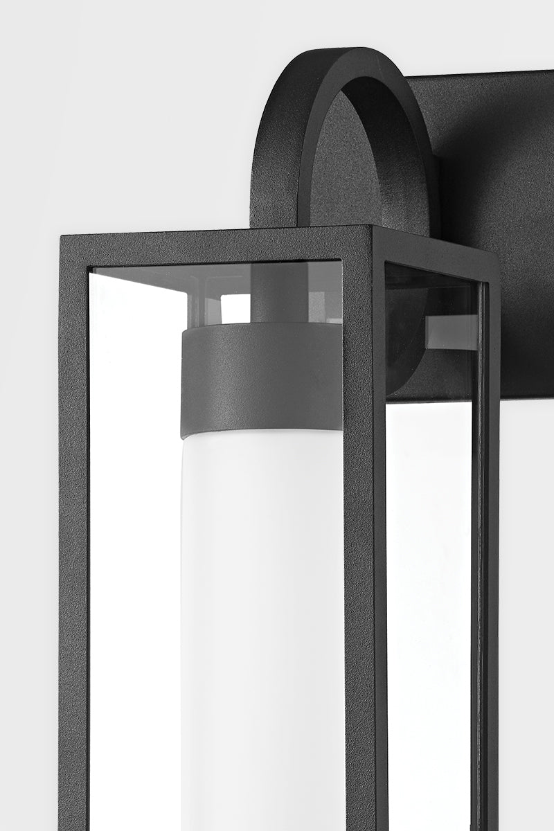 Textured Black Arch Arm with Clear Glass Shade Outdoor Wall Sconce