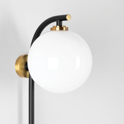 Steel Curve Arm with White Glass Globe Plug In Wall Sconce