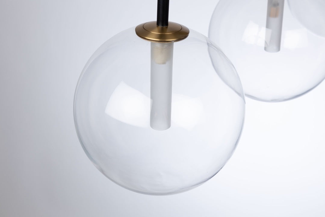 Matte Black and Brass Finish with Clear Glass Globe Linear Pendant