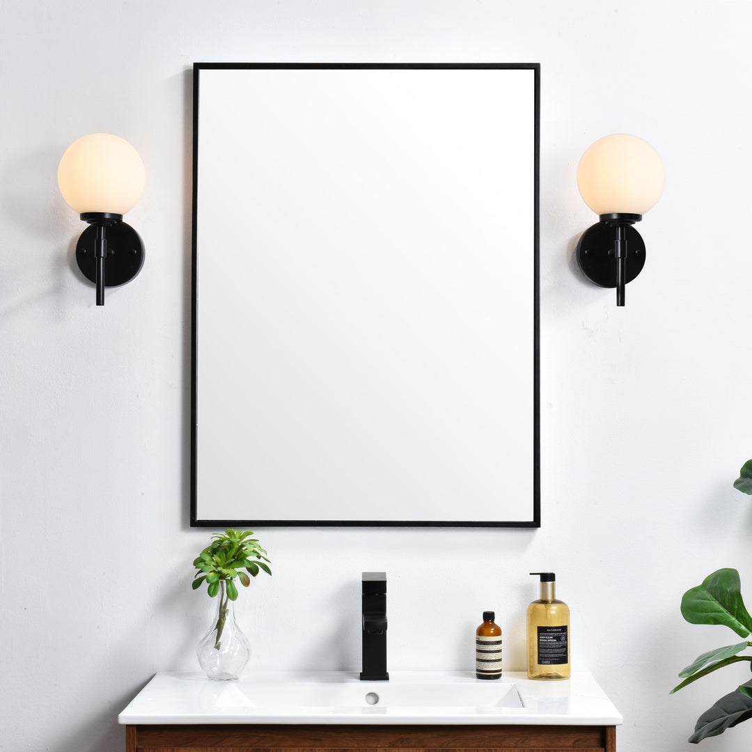 Steel Frame with Frosted Glass Globe Shade Wall Sconce by Living District - view 10