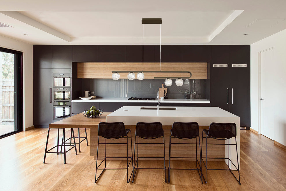 Black Steel Curve Frame with Clear Glass Globe Linear Pendant by iKo - view 2
