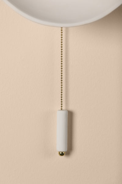 Aged Brass Frame and Ceramic Raw Matte White Shade with White Glass Globe Wall Sconce
