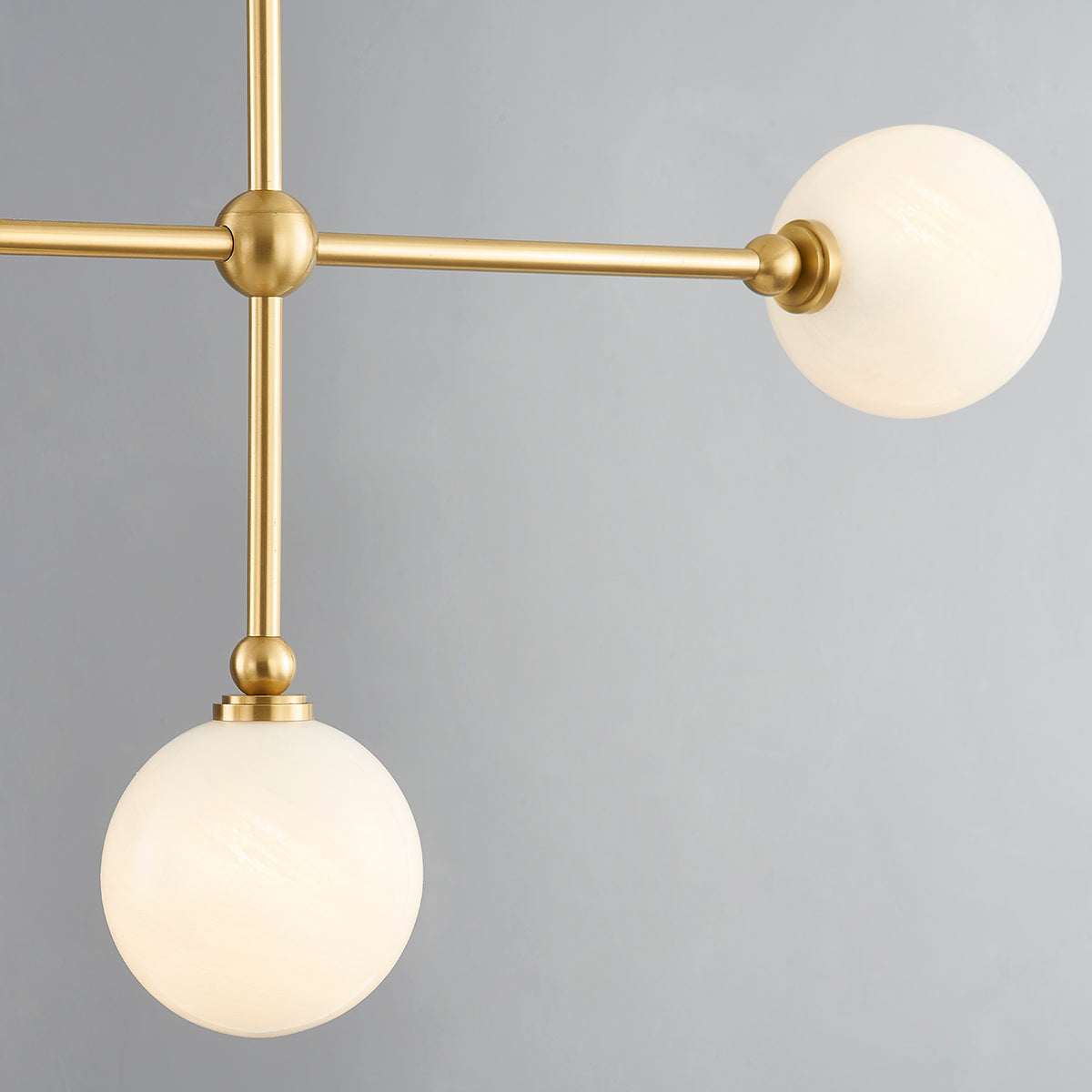 Aged Brass Rod Frame with Cloud Globe Glass Shade Linear Chandelier